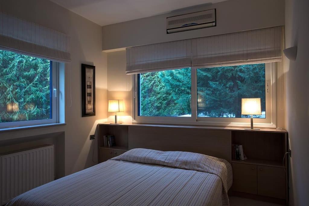 Postel nebo postele na pokoji v ubytování Melissaki Villas