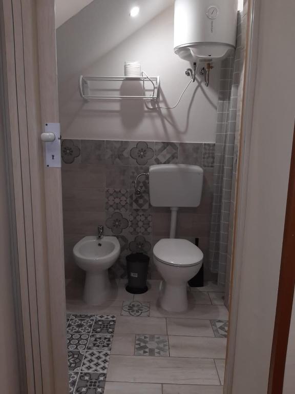 Kúpeľňa v ubytovaní CASA VACANZA DI VIA GIACALONE