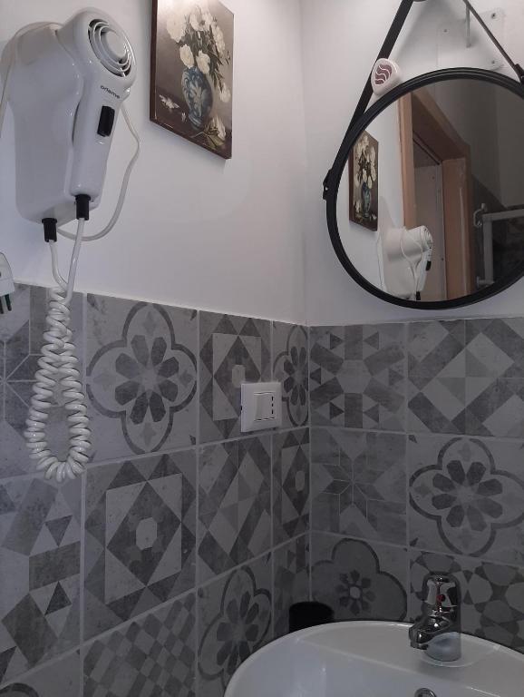 Kúpeľňa v ubytovaní CASA VACANZA DI VIA GIACALONE