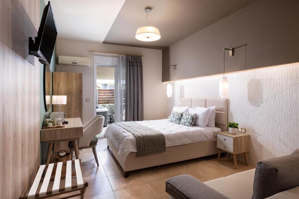 Postel nebo postele na pokoji v ubytování ELLE Rooms & Suites
