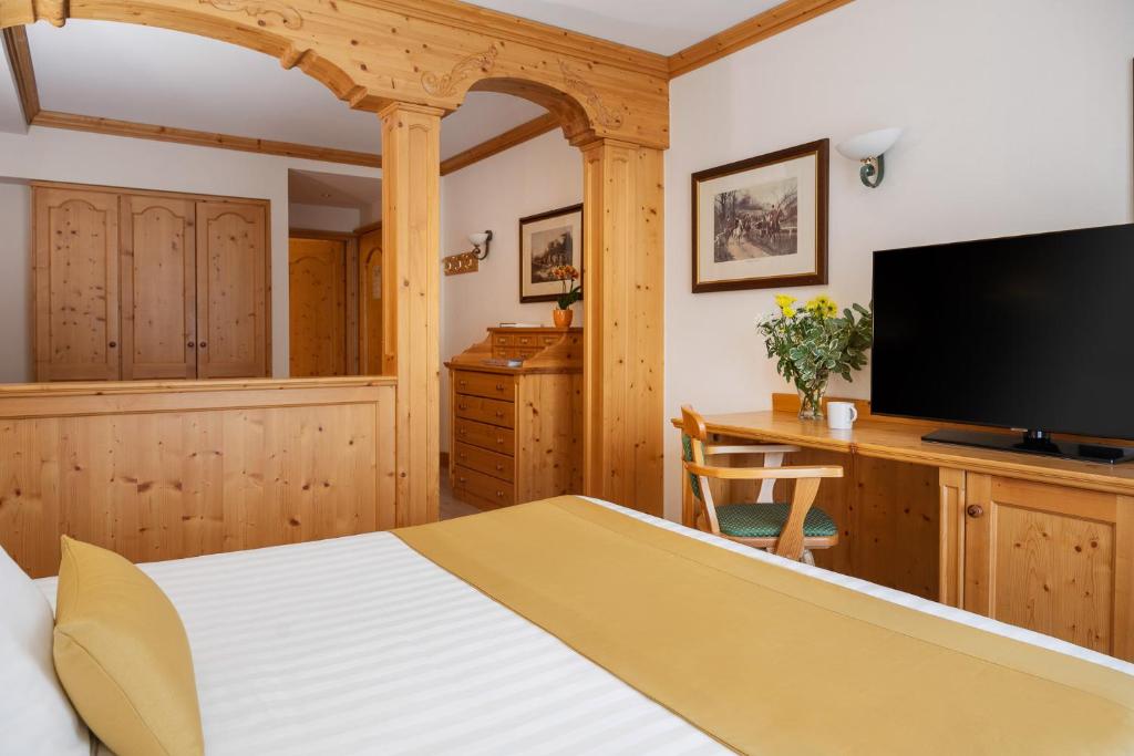 TV a/nebo společenská místnost v ubytování Hotel Cristallo