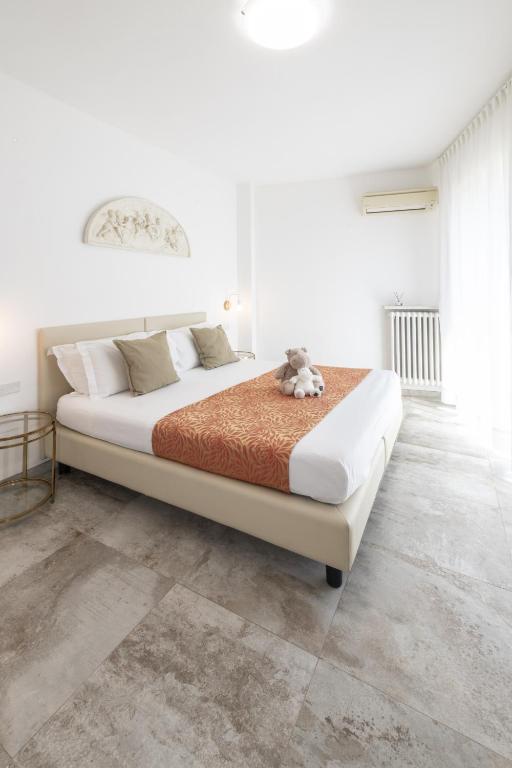 Postel nebo postele na pokoji v ubytování Hotel Brennero