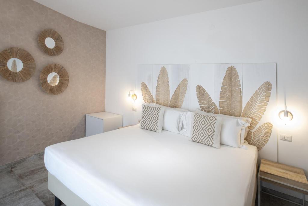 Postel nebo postele na pokoji v ubytování Hotel Brennero