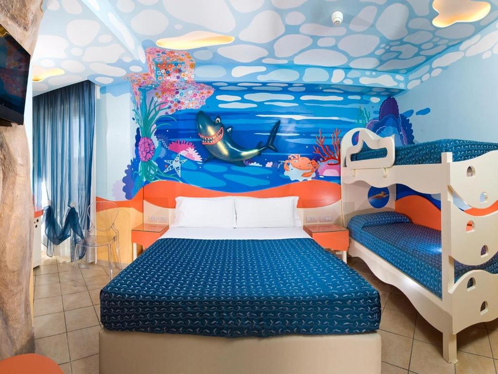 Postel nebo postele na pokoji v ubytování Hotel La Cappuccina