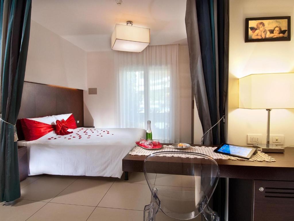 Postel nebo postele na pokoji v ubytování Hotel La Cappuccina