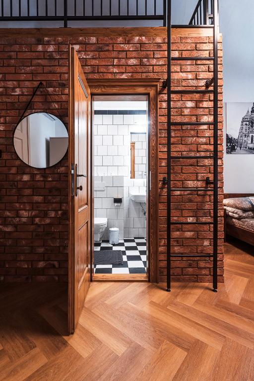 Postel nebo postele na pokoji v ubytování Apartmány Krmanova