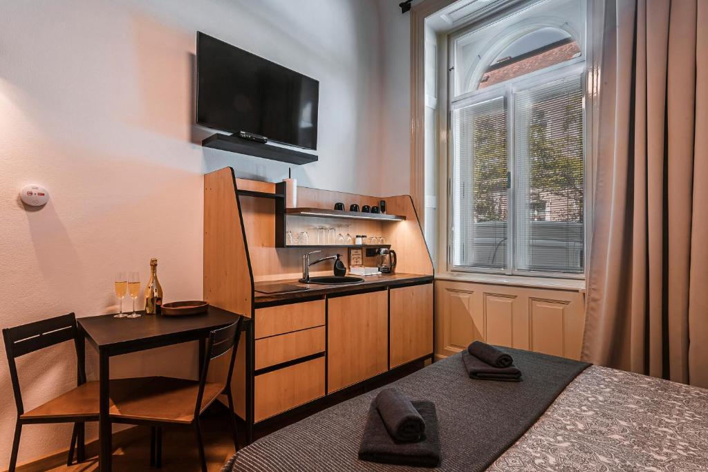 Kuchyň nebo kuchyňský kout v ubytování Apartmány Krmanova