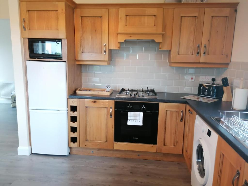 Kuchyň nebo kuchyňský kout v ubytování Atlantic way Apartment