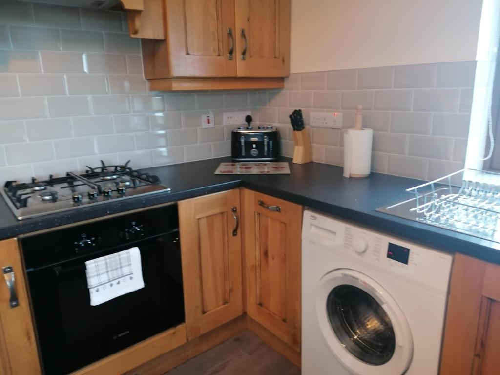Kuchyň nebo kuchyňský kout v ubytování Atlantic way Apartment