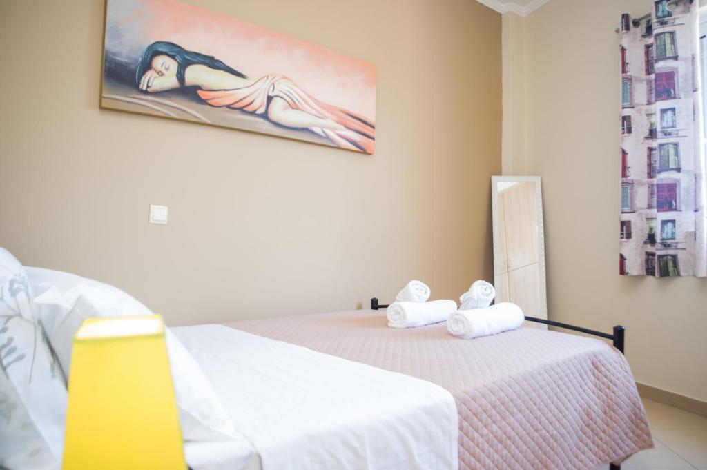 Postel nebo postele na pokoji v ubytování Kalamata Alex Apartments