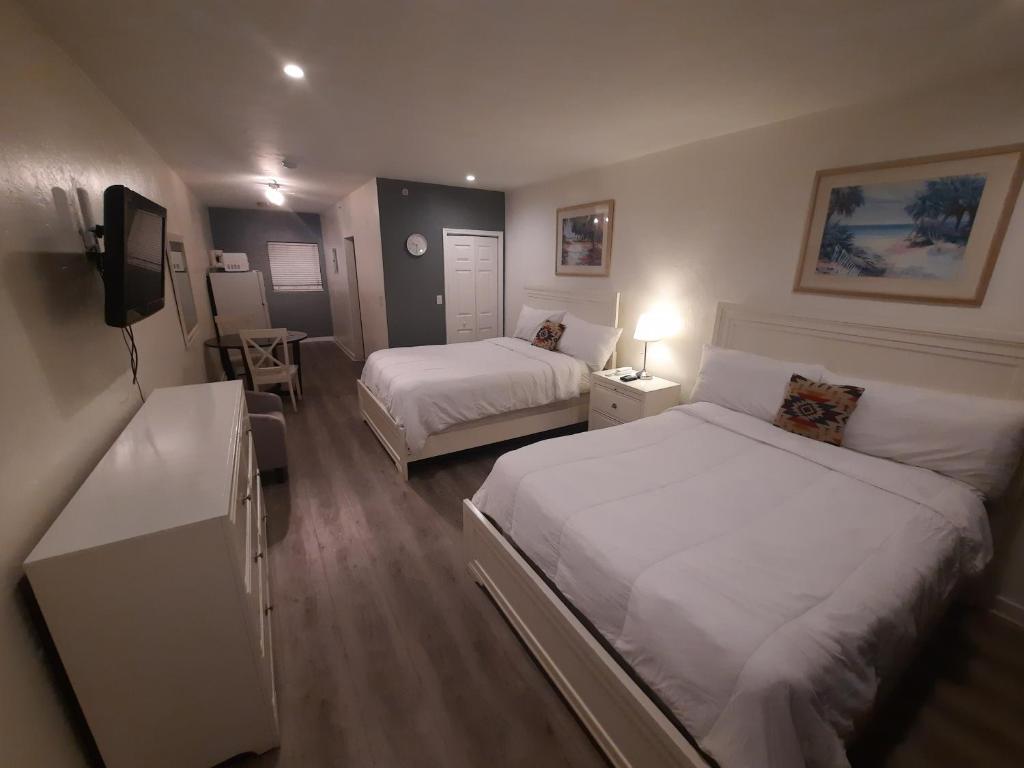 Cama o camas de una habitación en Stardust Hotel