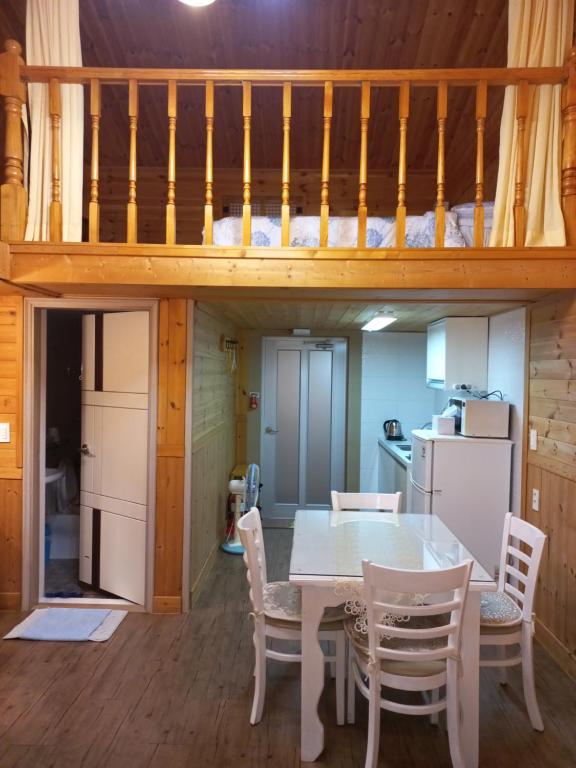 Kuchyň nebo kuchyňský kout v ubytování Good Day Pension