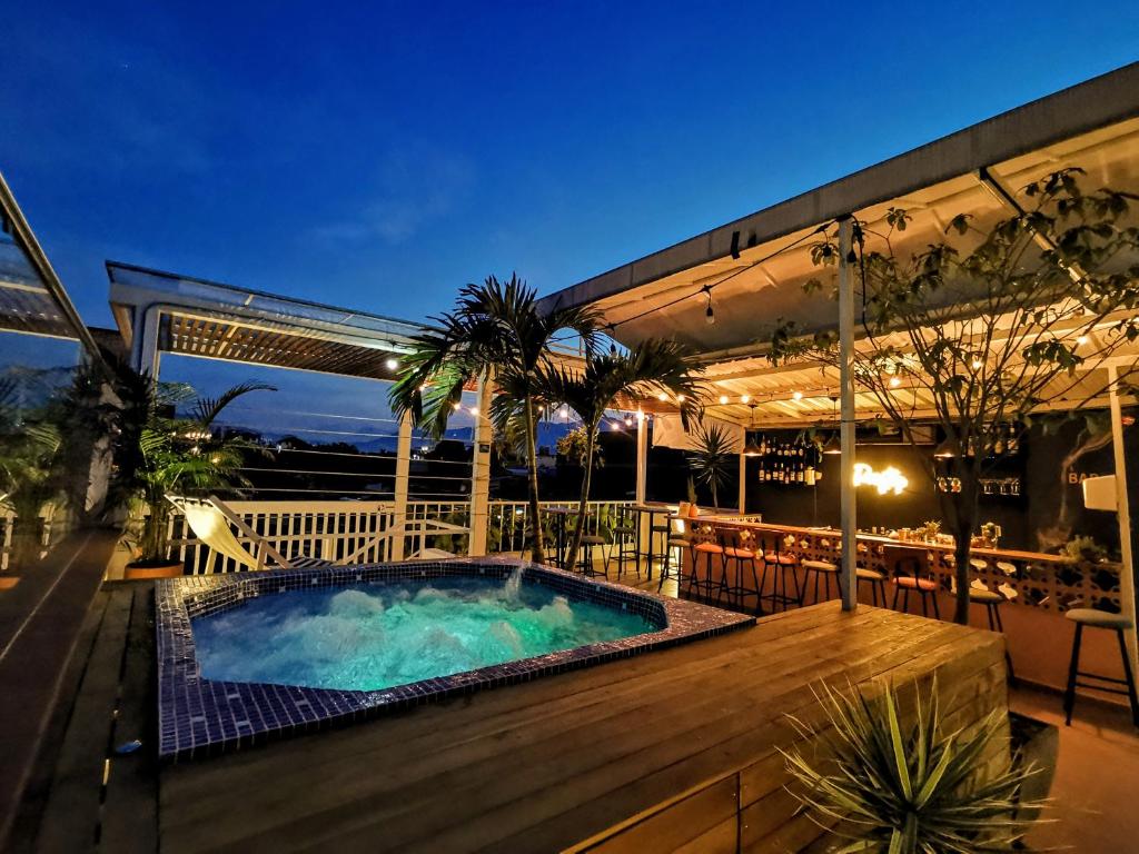 a swimming pool on the balcony of a building at La Martina Hotel Boutique in Medellín