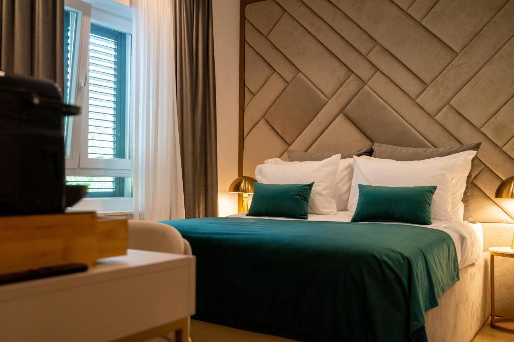 Posteľ alebo postele v izbe v ubytovaní Amélie Luxury Rooms