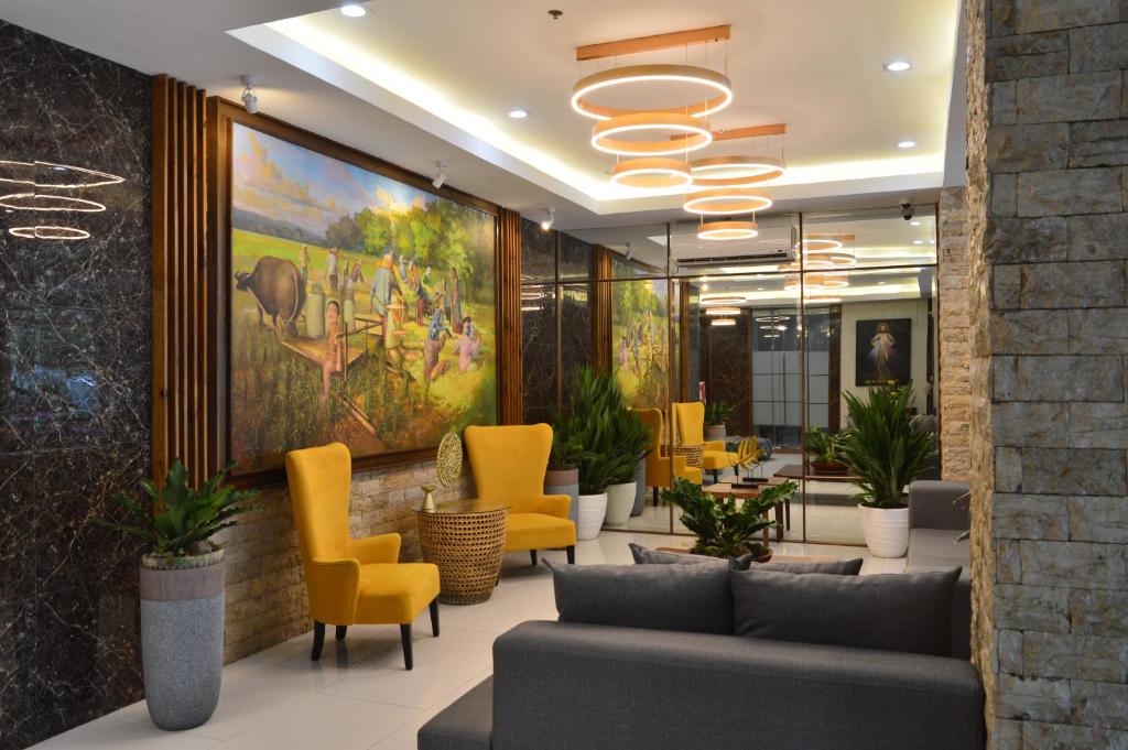 Posezení v ubytování Carlosta Hotel