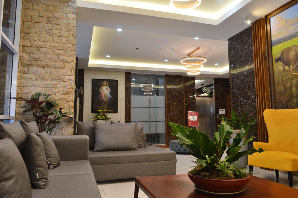Posezení v ubytování Carlosta Hotel