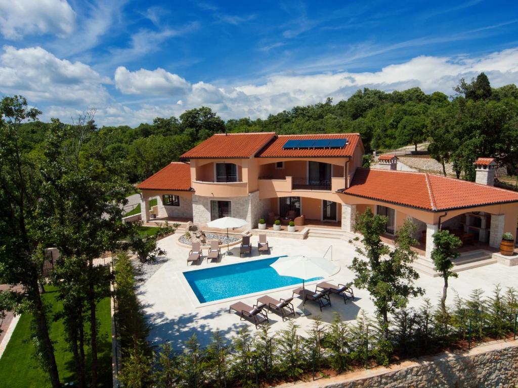 an aerial view of a house with a swimming pool at Villa Antonija in Labin