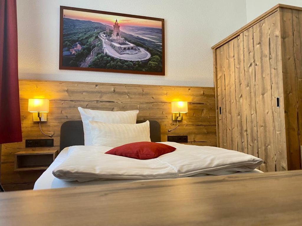 Voodi või voodid majutusasutuse Hotel Friedchen mit eigener Fleischerei toas