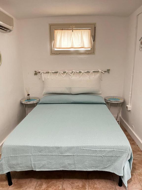 Postel nebo postele na pokoji v ubytování Camping Car Palmasera