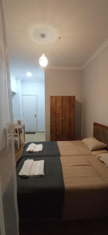 Postel nebo postele na pokoji v ubytování Hotel Posta Khulo