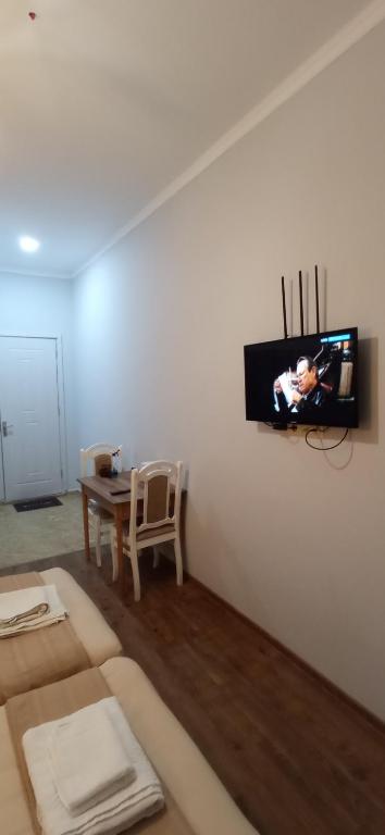 TV a/nebo společenská místnost v ubytování Hotel Posta Khulo