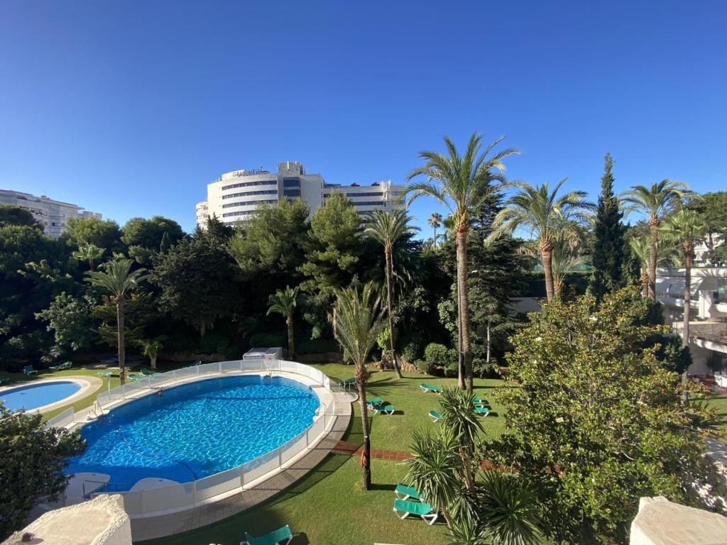 Bazén v ubytovaní 2 apartamentos muy luminosos con grandes terraza alebo v jeho blízkosti