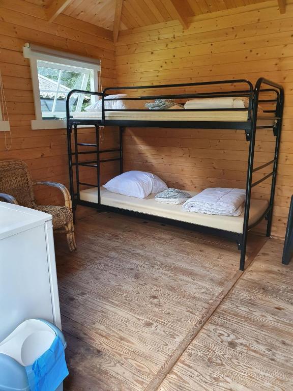 Postel nebo postele na pokoji v ubytování Camping de Oude Rijn