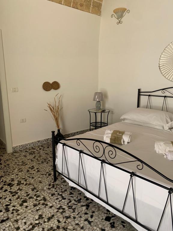 Letto o letti in una camera di Nonna Veronica