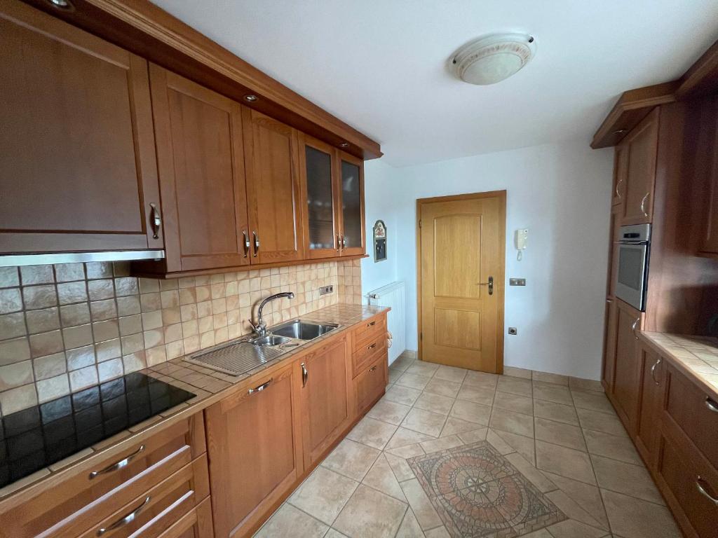Kuchyň nebo kuchyňský kout v ubytování Apartmaji Iva