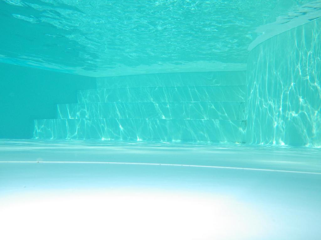 The swimming pool at or close to Hotel Isola Rossa