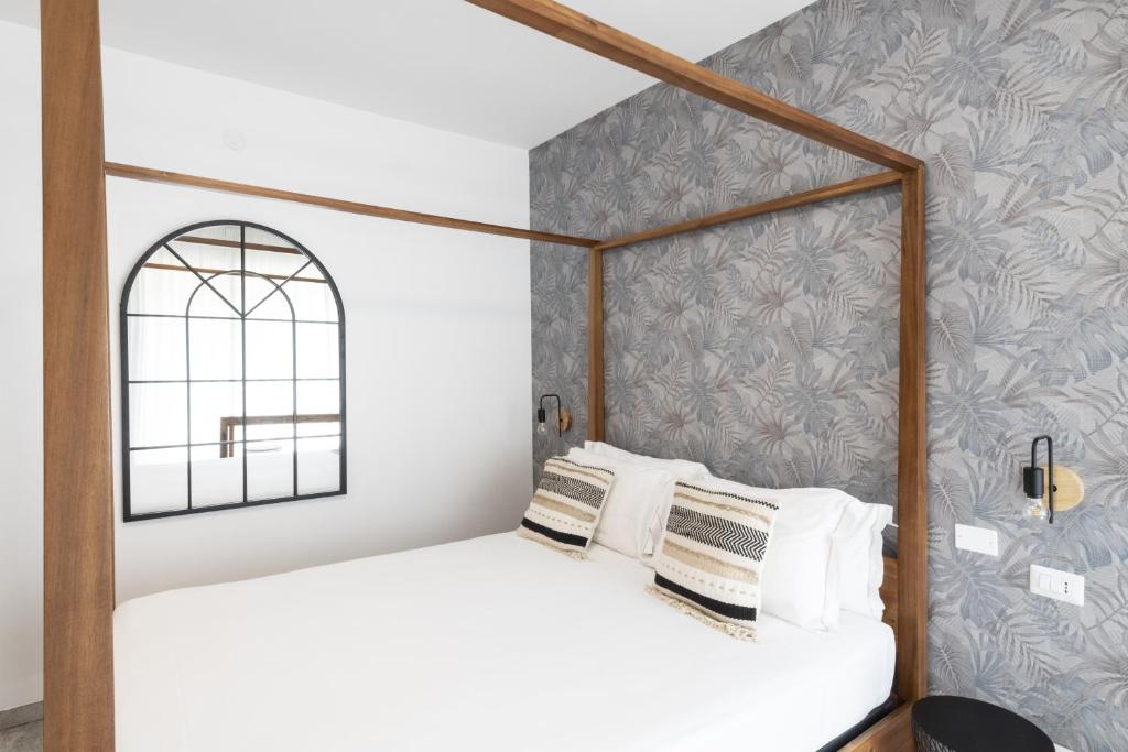 Postel nebo postele na pokoji v ubytování Hotel Brennero