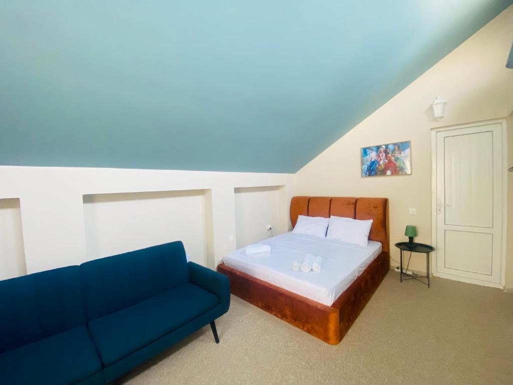 Postel nebo postele na pokoji v ubytování Mose art Hotel