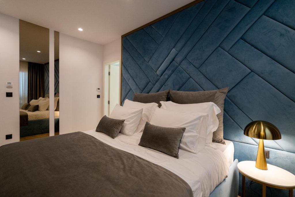 Posteľ alebo postele v izbe v ubytovaní Amélie Luxury Rooms