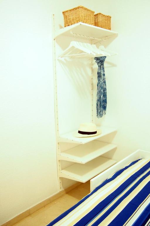 A bed or beds in a room at VERO Granada y PARKING en el edificio