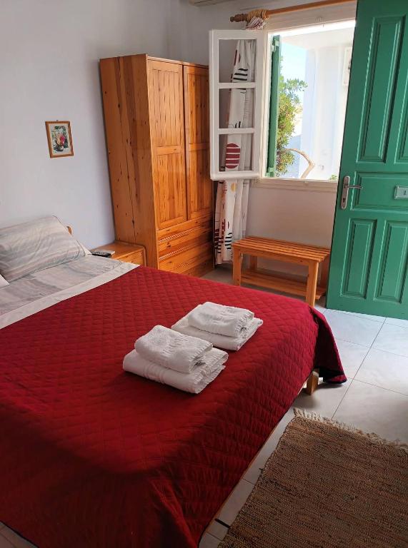Postel nebo postele na pokoji v ubytování Dioni Lux inn 2