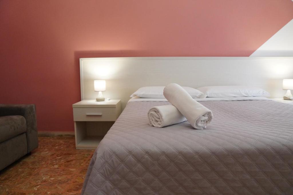 Postel nebo postele na pokoji v ubytování Residence I Due Fratelli