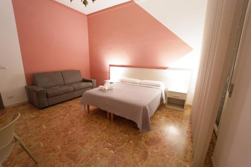 Postel nebo postele na pokoji v ubytování Residence I Due Fratelli