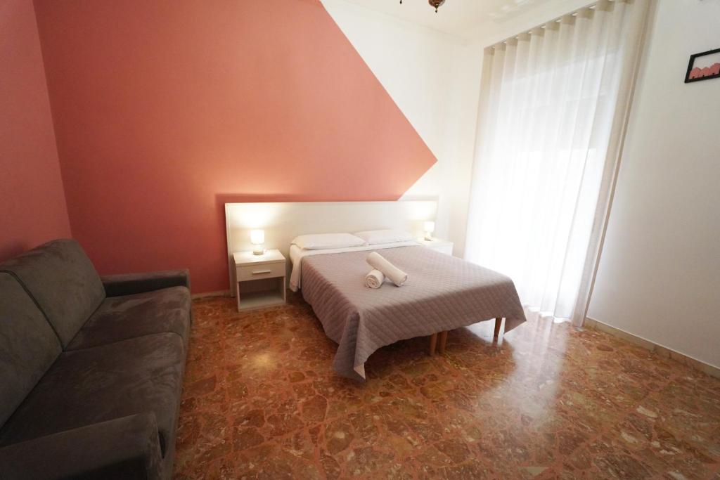 Postel nebo postele na pokoji v ubytování Residence I Due Fratelli