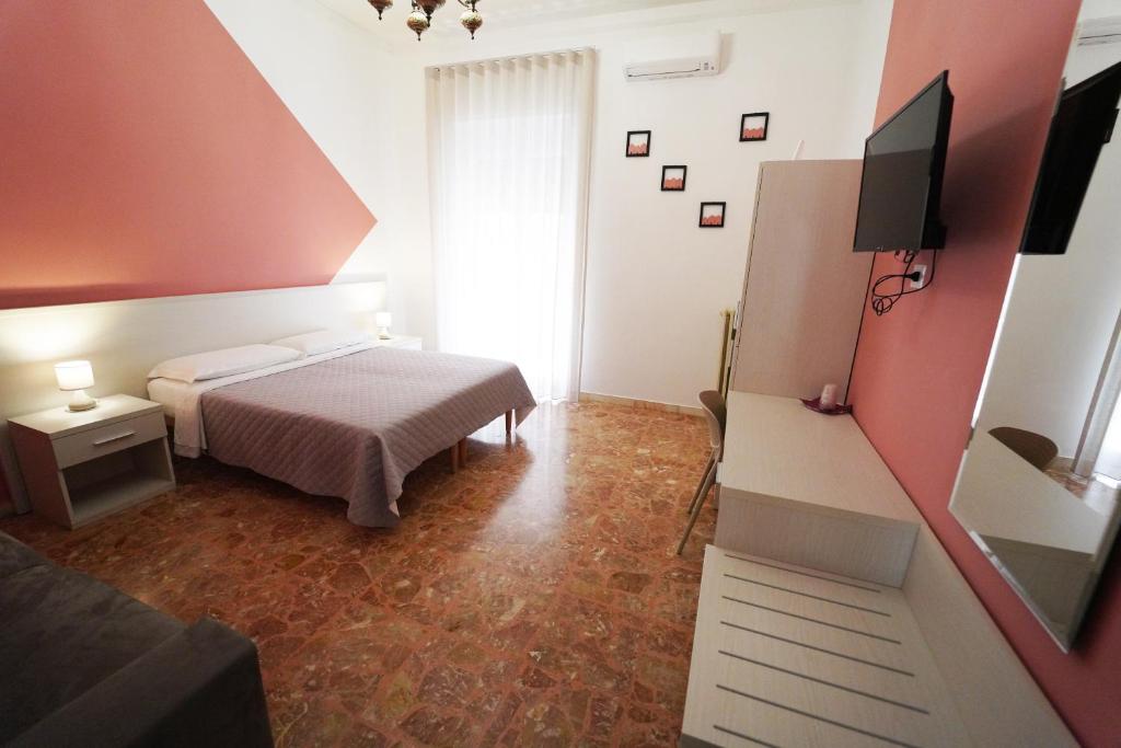 Postel nebo postele na pokoji v ubytování Residence I Due Fratelli