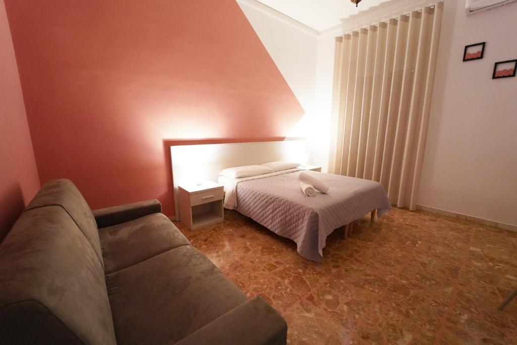 Postel nebo postele na pokoji v ubytování Residence I Due Fratelli