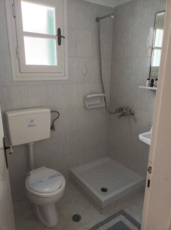 Koupelna v ubytování Dioni Lux inn 2