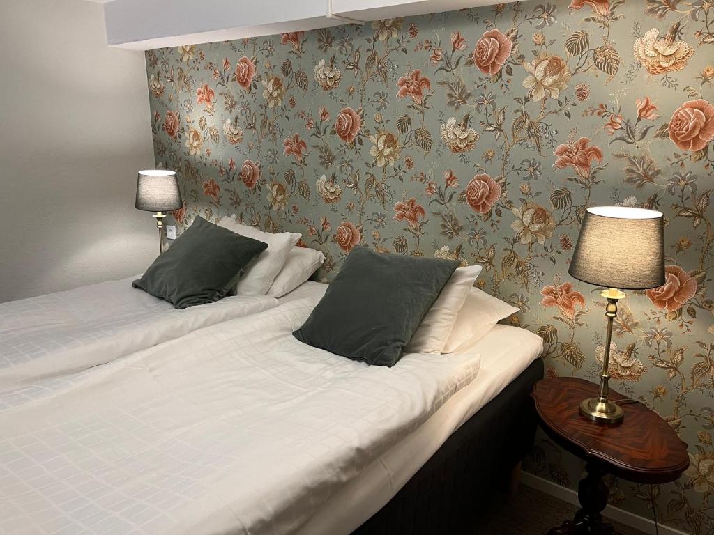 Postel nebo postele na pokoji v ubytování Hotell Bele