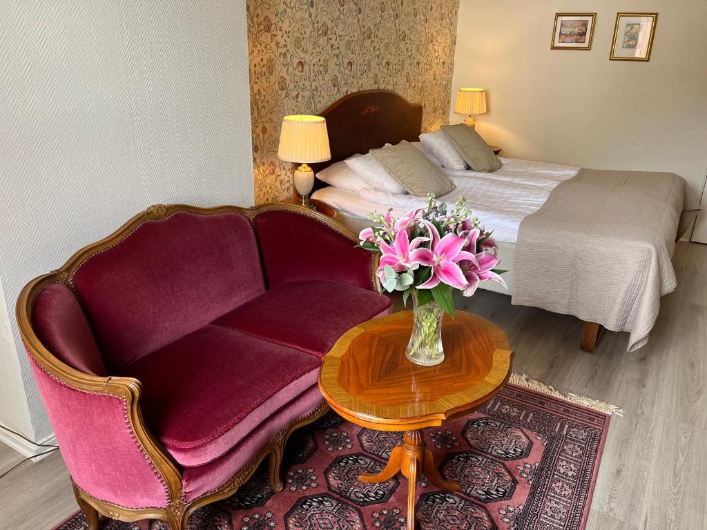 Postel nebo postele na pokoji v ubytování Hotell Bele