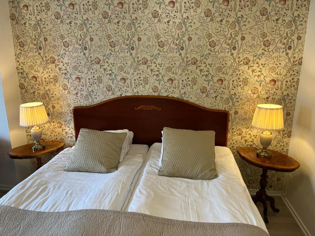 Postel nebo postele na pokoji v ubytování Hotell Bele