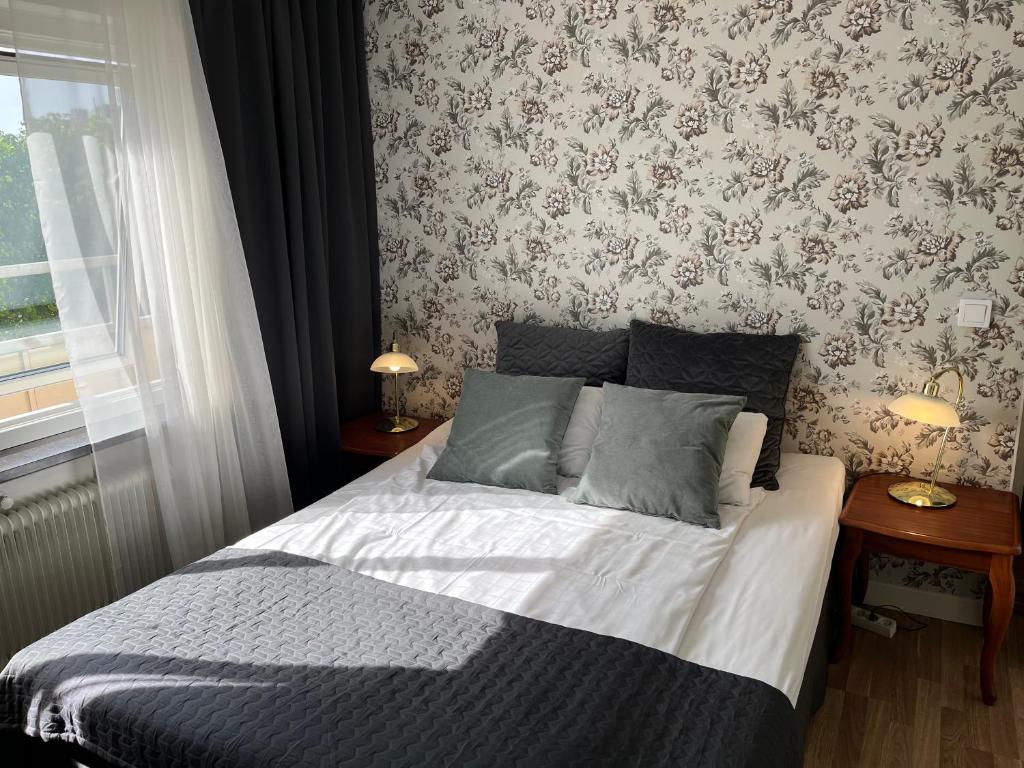 Postel nebo postele na pokoji v ubytování Hotell Bele