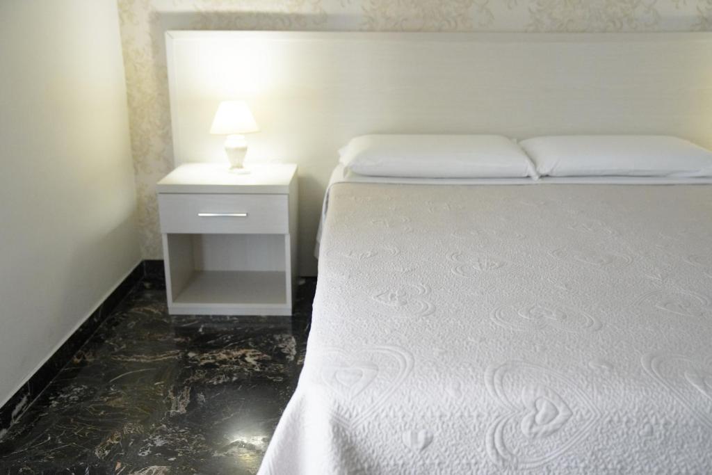 Postel nebo postele na pokoji v ubytování Residence I Due Fratelli
