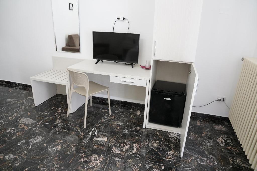 TV a/nebo společenská místnost v ubytování Residence I Due Fratelli