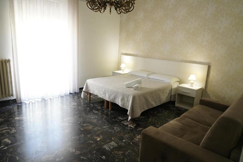 Postel nebo postele na pokoji v ubytování Residence I Due Fratelli