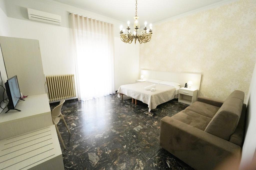 Postel nebo postele na pokoji v ubytování Residence I Due Fratelli