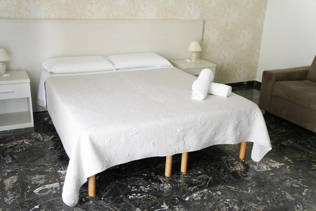 Postel nebo postele na pokoji v ubytování Residence I Due Fratelli